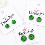 Green Sparkle Singles in Stainless Steel Settings -Earrings